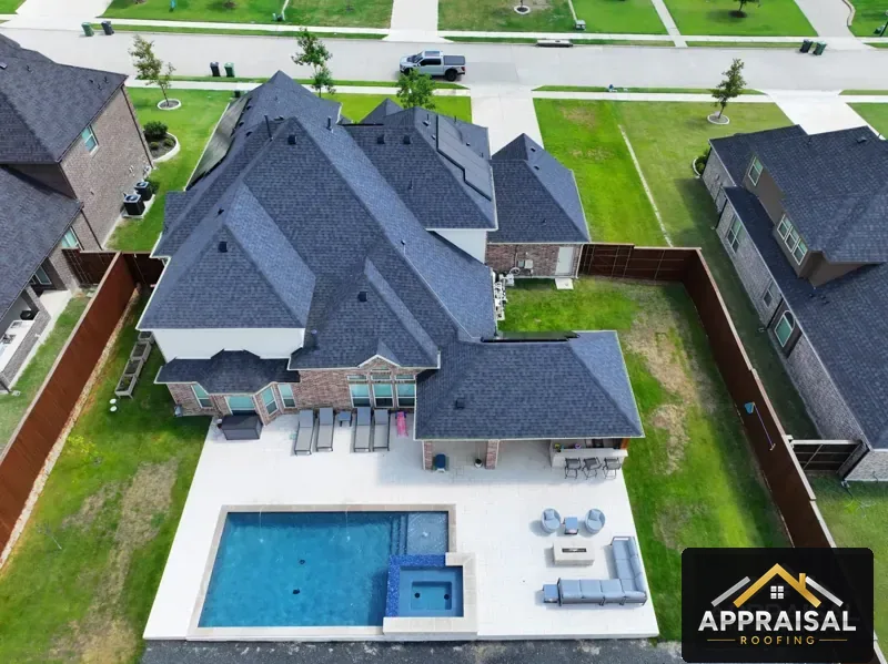 Finished roof on a home with a backyard pool