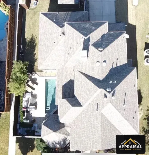 Drone photo of a shingle roof during a hail damage inspection